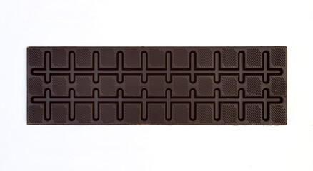 sweet and delicious whole chocolate bar is lying on white background, photo taken from above