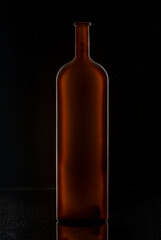 Eempty bottle of red wine