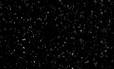 Snowfall on black background, an abstract background,Defocused Lights .