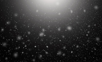 Fototapeta na wymiar Snowfall on black background, an abstract background,Defocused Lights .