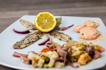 appetizer with seafood and wine