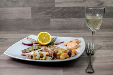 appetizer with seafood and wine