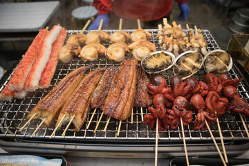 Fresh japanese sea food as bbq in Osaka.