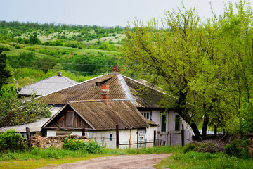 Fototapeta na wymiar View of traditional village wooden clay white houses