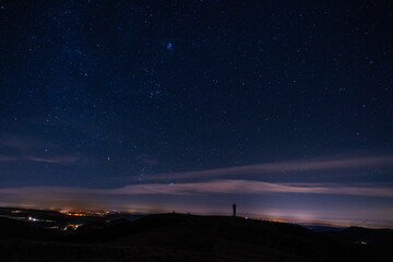 View of the Feldberg tower in the Black Forest in Germany and the starry sky shot in November 2019