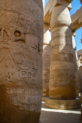 KARNAK TEMPLE - Massive columns inside beautiful Egyptian landmark with hieroglyphics, and ancient...
