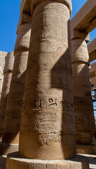 KARNAK TEMPLE - Massive columns inside beautiful Egyptian landmark with hieroglyphics, and ancient...