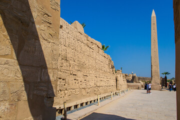 KARNAK TEMPLE - Massive columns inside beautiful Egyptian landmark with hieroglyphics, and ancient...