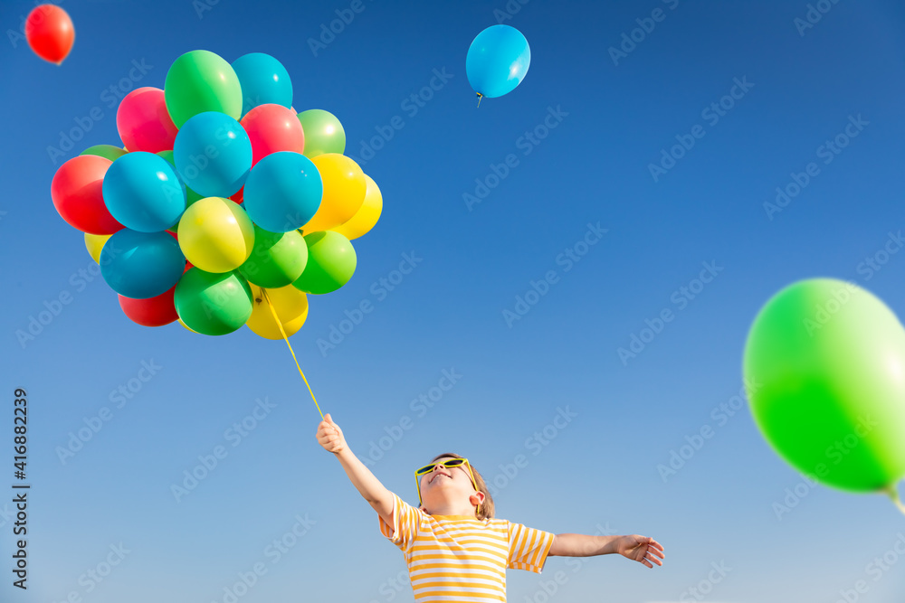 Canvas Prints happy child playing outdoors in spring field