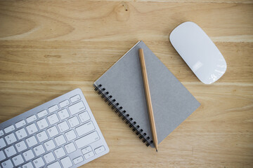 Stylish office table desk. Workspace with laptop, diary, succulent on white background. 