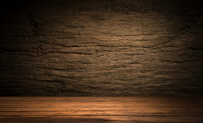Selected focus empty brown wooden table and wall texture or old black brick wall blur background image. for your photomontage or product display