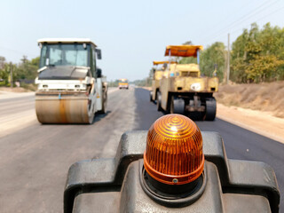Road construction blur By heavy machinery