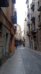 European street in the old town. Pedestrian street in Girona