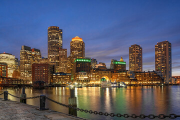 Boston skyline from Fan Pier at the fantastic twilight time with smooth water river in boston, Massachusetts, USA downtown skyline, Architecture and building with tourist and travel concept