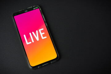 Phone with Live stream logo on black background