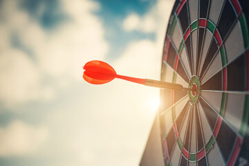 Close up shot of the dart arrow hit on bulleyes of dartboard to represent that the business reached...