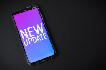 New update - Phone on black background