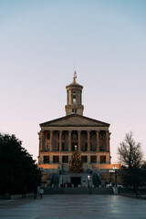 Fototapeta na wymiar Tennessee State Capitol building and mall at dusk with Christmas tree and lights.