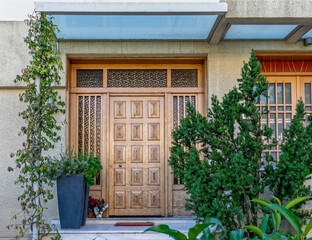 contemporary house entrance natural wood door, Athens Greece