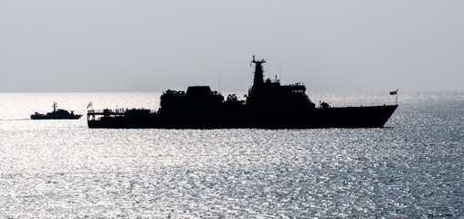Sri Lanka Navy ship at anchor off the coast of Colombo at sunset