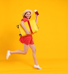 happy traveler young woman running merrily with suitcase