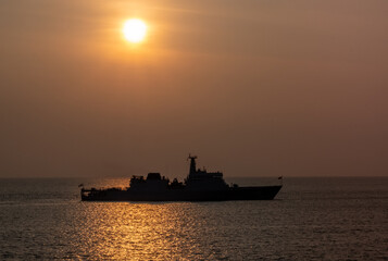 Sri Lanka Navy ship at anchor at sunset off the coast at Colombo