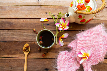 herbal healthy drinks hot tea rose  with teapot, flowers frangipani, dried rose, knitting wool...