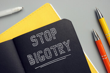 Conceptual photo about STOP BIGOTRY with handwritten text. The Stop Bigotry meme likely works well...