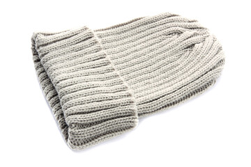 Light gray knitted wool hat on white background