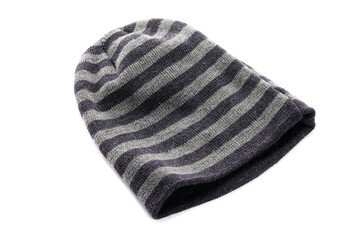 Wool knitted winter hat on the white background
