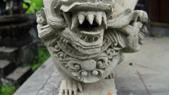 Typical Bali architecture. Moving the camera and hitting it with focus on the face.
