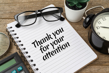 Creative concept Thank You For Your Attention text on notebook.