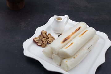broiled bar rice cake korean food. stick of rounded rice cake.