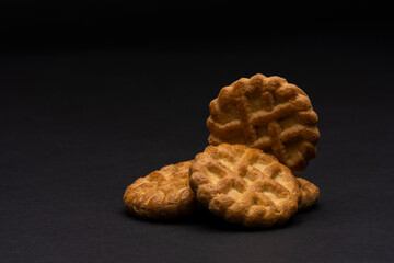 biscuits on black background