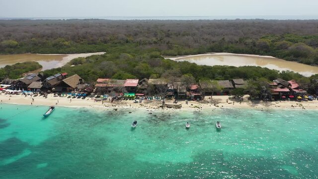 The paradies white sand beach of Playa Blanca on Island Baru by Cartagena in Colombia aerial view.