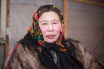 Woman in the national winter clothes of the northern inhabitants of the tundra, the Arctic circle