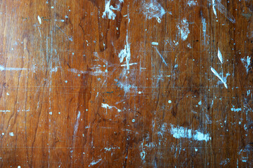 Old wooden background with colorful paint stains