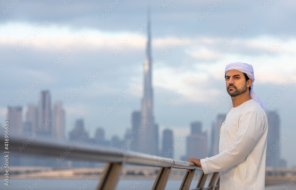 Wall mural emirati man in traditional clothing in Al Jaddaf Waterfront Dubai