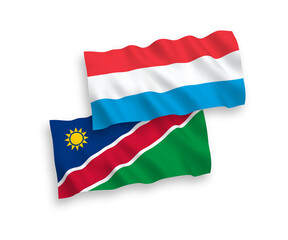 Flags of Republic of Namibia and Luxembourg on a white background