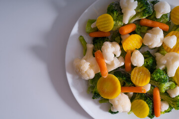 Frozen vegetables. Carrots, cabbage, broccoli, cauliflower, zucchini.
