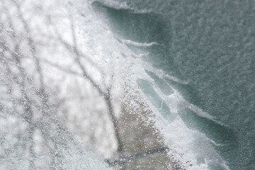 snow and ice removal from glass