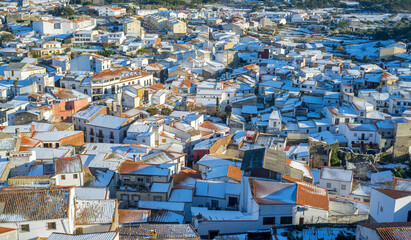 Snow-covered Montanchez town overview. Caceres, Extremadura, Spain