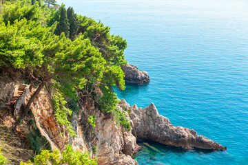 Turquoise Sea Water of Coastal Rocks . Coastline Rock Formation Scenery