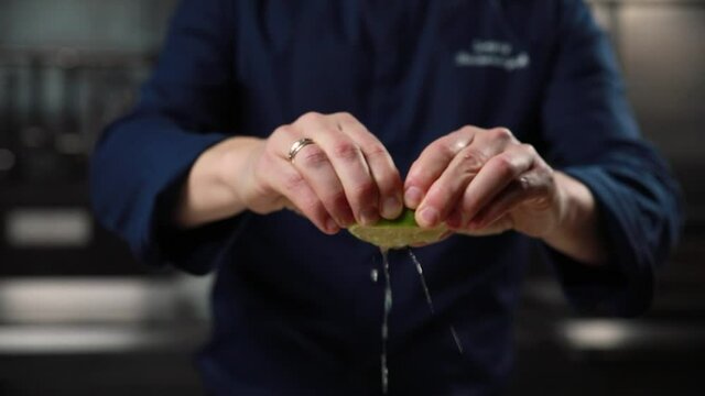 The chef prepares citrus dishes
