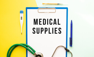 MEDICAL SUPPLIES text on a letterhead in a medical folder on a beautiful background.