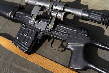 A rifle with a telescopic sight. Firearms for sniper battles. Close-up