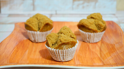 muffins on a wooden table