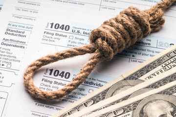 Tax Form 1040, and also money and hangman's knot. Tax problems, concept