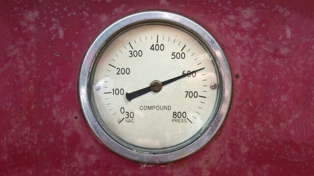 An Industrial Pressure Gauge As It Rises And Falls