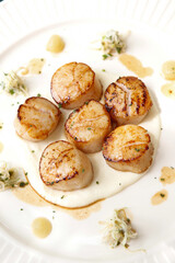 grilled scallop on plate
